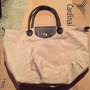 tanger outlet purses